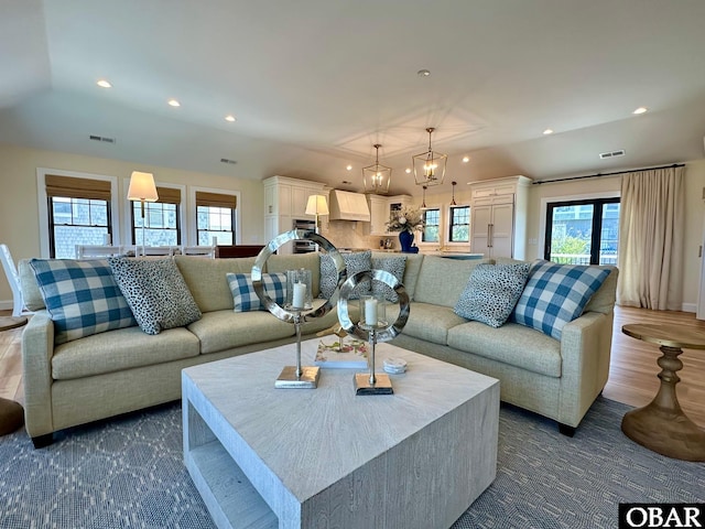 126 Buffell Head Rd Lot 146, Duck, NC 27949 - living area featuring recessed lighting, baseboards, a chandelier, and dark wood-style flooring