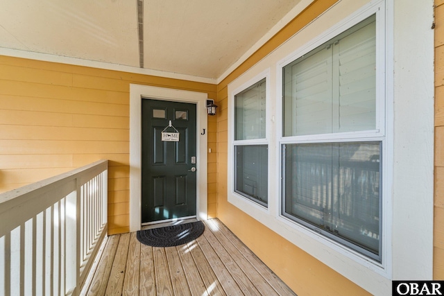 property entrance with a balcony