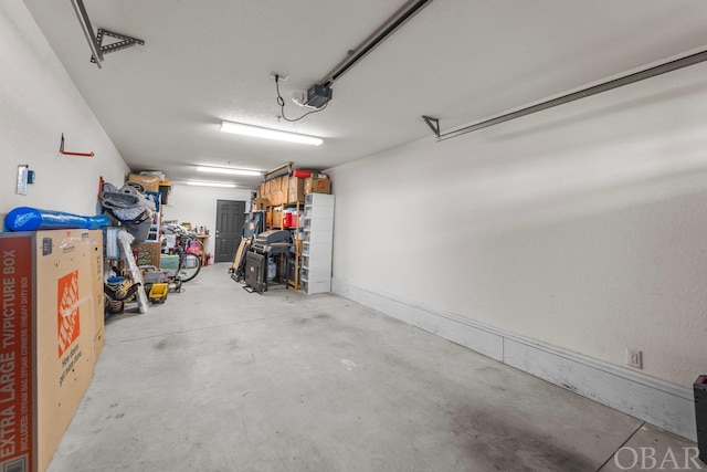 garage featuring a garage door opener