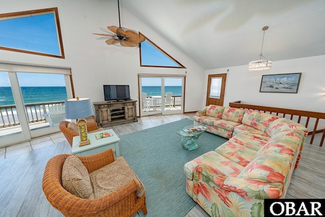 24143 Ocean Dr Lot 4, Rodanthe, NC 27968 - living room featuring high vaulted ceiling, a ceiling fan, wood finished floors, and a chandelier