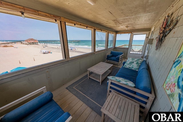 24143 Ocean Dr Lot 4, Rodanthe, NC 27968 - sunroom / solarium featuring view of water and beach and an outdoor hangout area