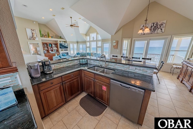 22097 Sea Gull St Lot 7, Rodanthe, NC 27968 - kitchen with stainless steel dishwasher, a sink, ceiling fan, decorative light fixtures, and dark stone countertops