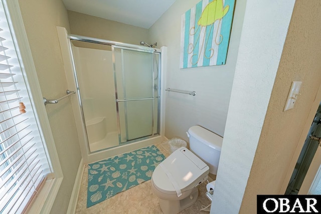 22097 Sea Gull St Lot 7, Rodanthe, NC 27968 - full bath with a stall shower, toilet, and tile patterned flooring