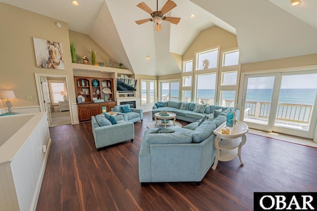 22097 Sea Gull St Lot 7, Rodanthe, NC 27968 - living room featuring a ceiling fan, high vaulted ceiling, dark wood-style floors, a glass covered fireplace, and recessed lighting