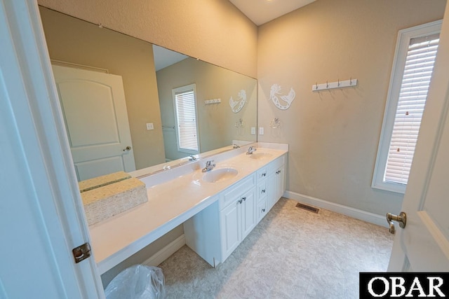 22097 Sea Gull St Lot 7, Rodanthe, NC 27968 - full bath featuring double vanity and baseboards