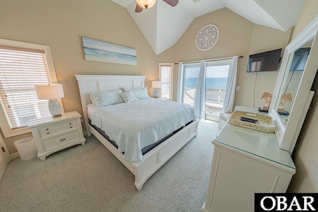 22097 Sea Gull St Lot 7, Rodanthe, NC 27968 - bedroom featuring access to exterior, light colored carpet, vaulted ceiling, and ceiling fan