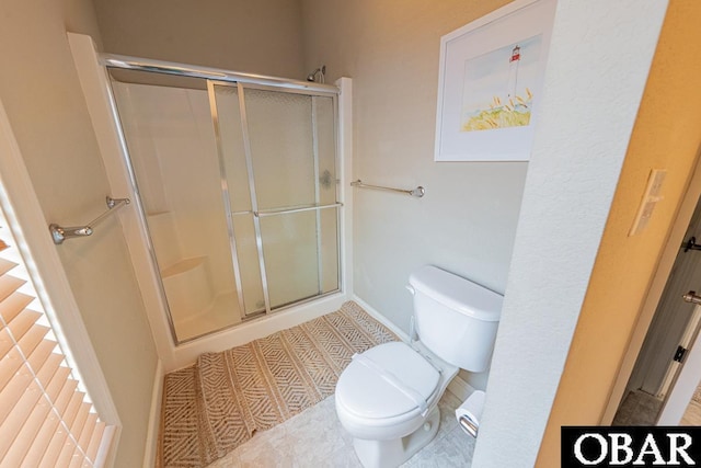 22097 Sea Gull St Lot 7, Rodanthe, NC 27968 - bathroom with a shower stall, toilet, and baseboards