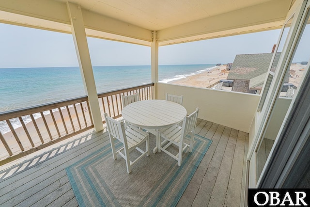 22097 Sea Gull St Lot 7, Rodanthe, NC 27968 - wooden terrace with view of water and beach and outdoor dining space