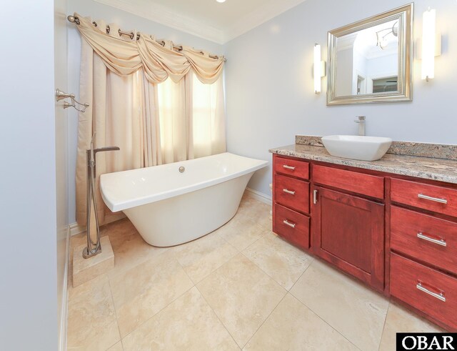 892 S Mills Rd Lot 10, Moyock, NC 27958 - bathroom featuring ornamental molding, tile patterned floors, vanity, and a freestanding tub