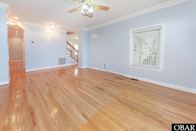 892 S Mills Rd Lot 10, Moyock, NC 27958 - spare room with a ceiling fan, crown molding, stairway, and light wood-type flooring