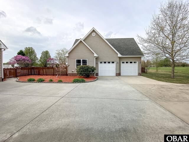 892 S Mills Rd Lot 10, Moyock, NC 27958 - view of front of home with driveway, a garage, and fence