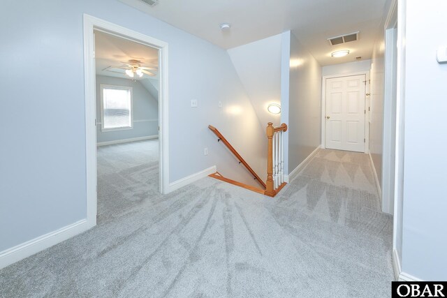 892 S Mills Rd Lot 10, Moyock, NC 27958 - hallway with an upstairs landing, visible vents, baseboards, carpet floors, and vaulted ceiling