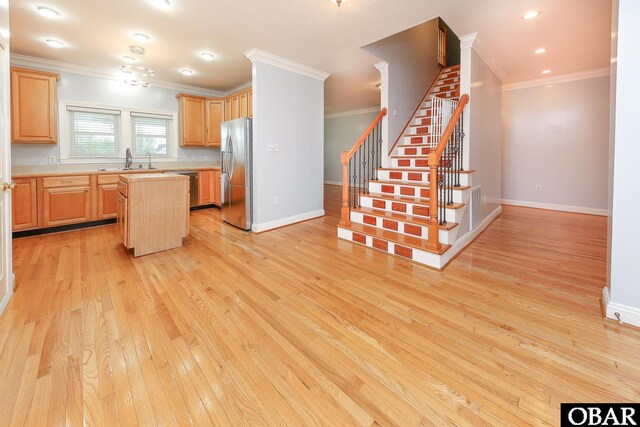 892 S Mills Rd Lot 10, Moyock, NC 27958 - kitchen with light countertops, stainless steel appliances, a kitchen island, a sink, and light wood finished floors