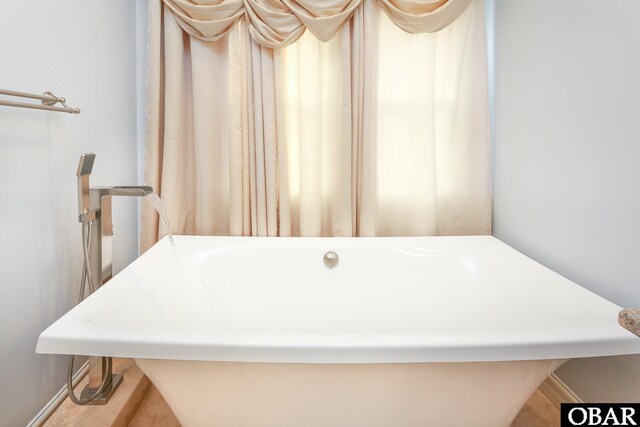 892 S Mills Rd Lot 10, Moyock, NC 27958 - bathroom with a freestanding tub