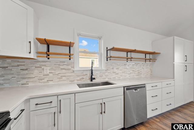 kitchen with white cabinets, light countertops, and stainless steel dishwasher