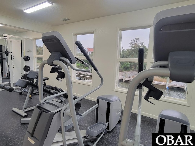 workout area featuring visible vents