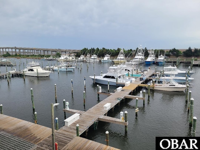 dock area featuring a water view