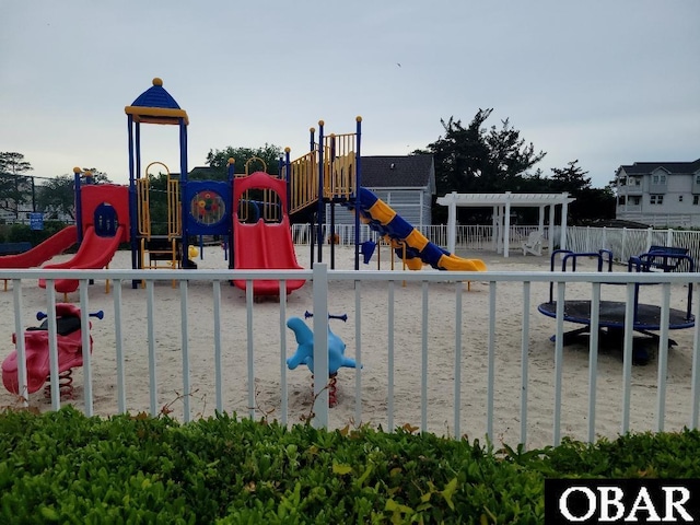 community jungle gym with fence