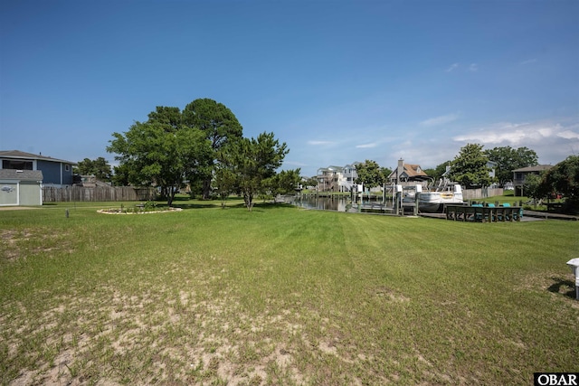 1602 Harbour View Dr Lot 119, Kill Devil Hills, NC 27948 - view of yard featuring a water view, a dock, and a residential view