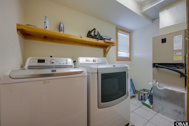 1602 Harbour View Dr Lot 119, Kill Devil Hills, NC 27948 - washroom featuring washing machine and clothes dryer and light tile patterned floors