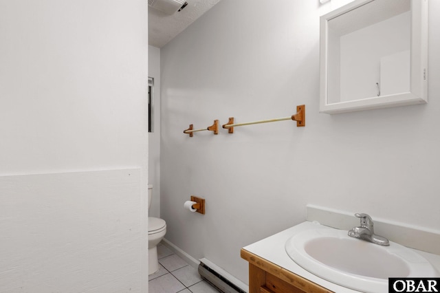 520 W Ocean Acres Dr Lot 36, Kill Devil Hills, NC 27948 - bathroom with baseboard heating, tile patterned flooring, and vanity