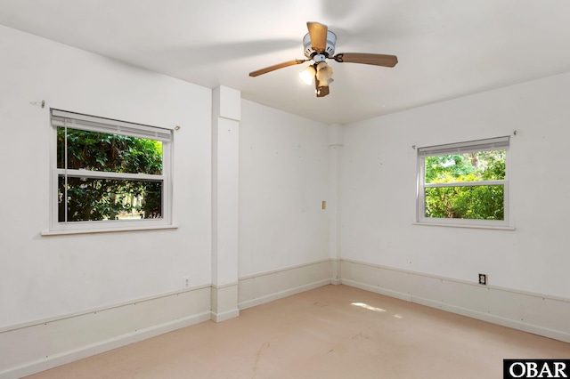 520 W Ocean Acres Dr Lot 36, Kill Devil Hills, NC 27948 - spare room with healthy amount of natural light and a ceiling fan