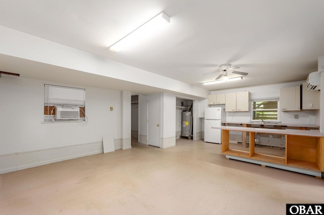 520 W Ocean Acres Dr Lot 36, Kill Devil Hills, NC 27948 - kitchen with freestanding refrigerator, water heater, concrete floors, a ceiling fan, and light countertops
