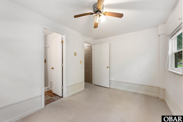 520 W Ocean Acres Dr Lot 36, Kill Devil Hills, NC 27948 - unfurnished bedroom with ceiling fan and ensuite bath
