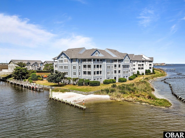 exterior space with a water view