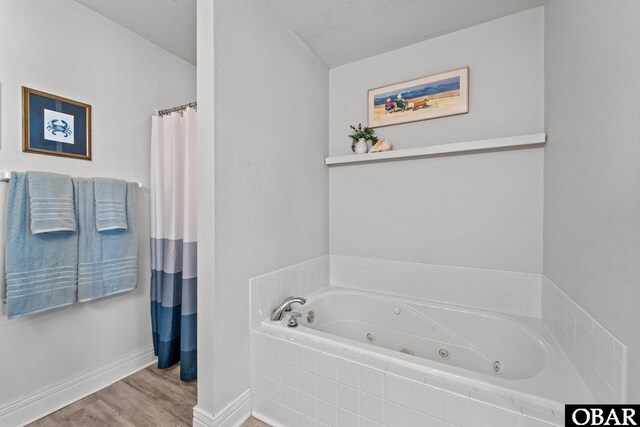 bedroom featuring wood finished floors