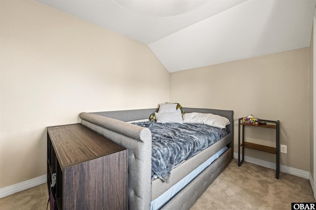 1108 Cambridge Rd Unit 307-A, Kill Devil Hills, NC 27948 - bedroom featuring lofted ceiling and carpet