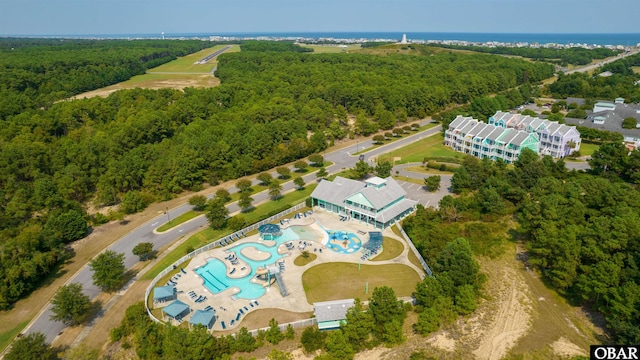 1108 Cambridge Rd Unit 307-A, Kill Devil Hills, NC 27948 - aerial view of a forest and a pool area