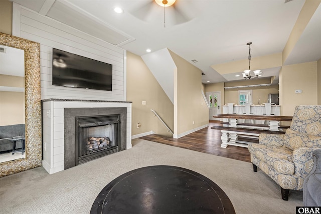 1108 Cambridge Rd Unit 307-A, Kill Devil Hills, NC 27948 - living area with carpet floors, recessed lighting, a fireplace, a ceiling fan, and wood finished floors