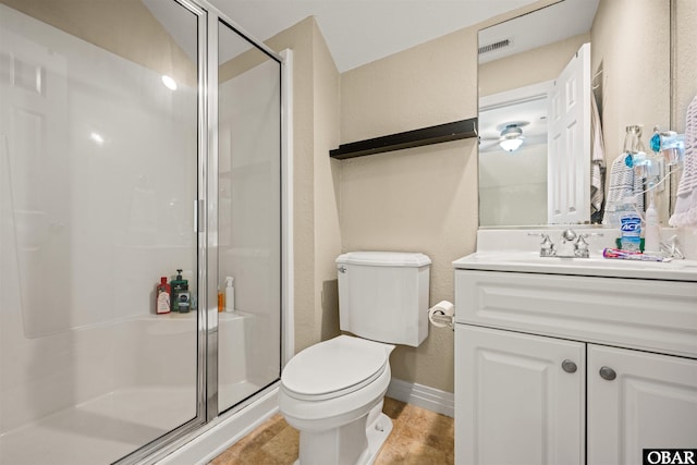 1108 Cambridge Rd Unit 307-A, Kill Devil Hills, NC 27948 - bathroom featuring a shower stall, vanity, and a textured wall
