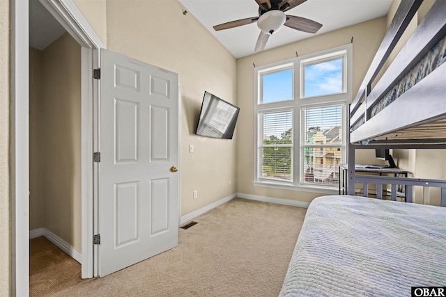 1108 Cambridge Rd Unit 307-A, Kill Devil Hills, NC 27948 - carpeted bedroom featuring multiple windows