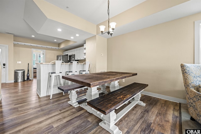 1108 Cambridge Rd Unit 307-A, Kill Devil Hills, NC 27948 - dining area featuring dark wood-style floors, a chandelier, and recessed lighting