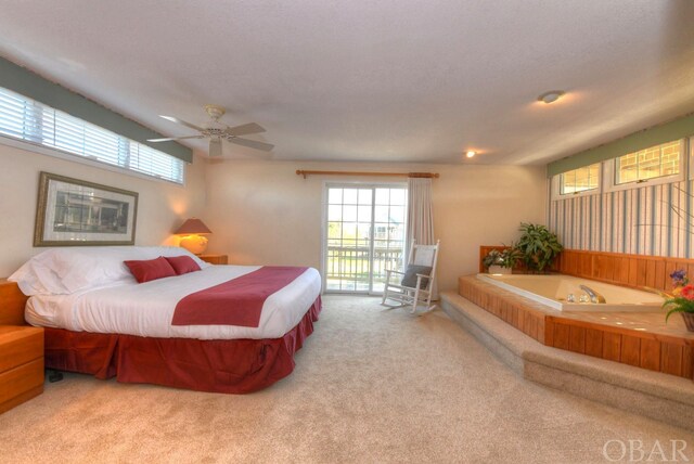 bedroom featuring light carpet and ceiling fan