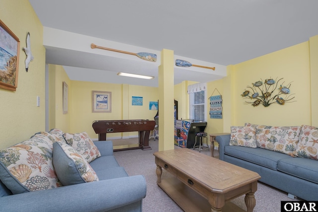 living area featuring carpet flooring