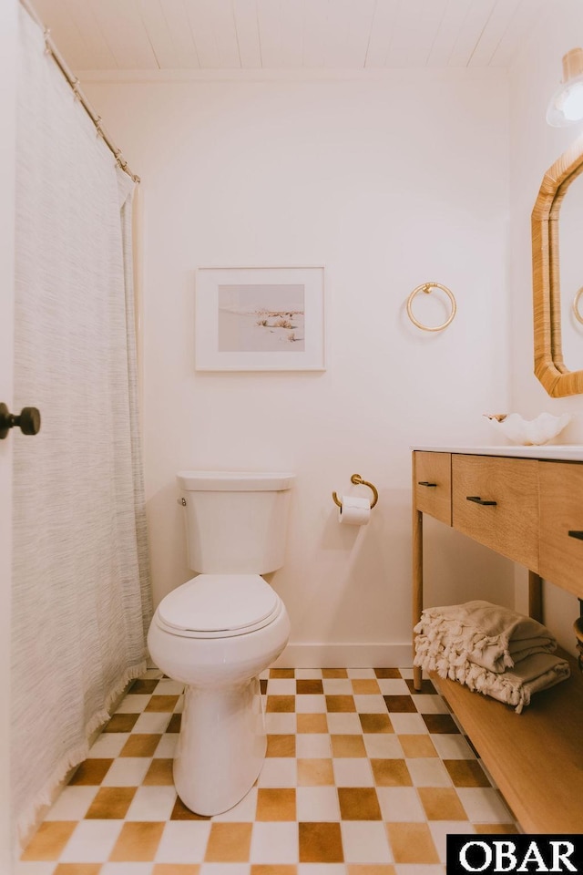 full bathroom with tile patterned floors, wooden ceiling, and toilet
