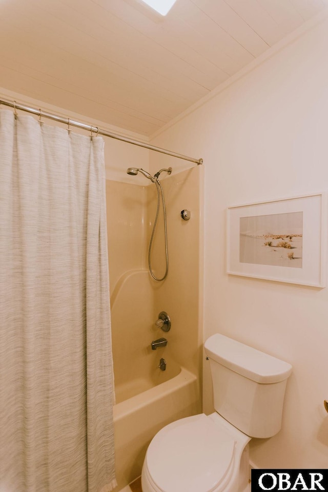 full bathroom with shower / tub combo and toilet