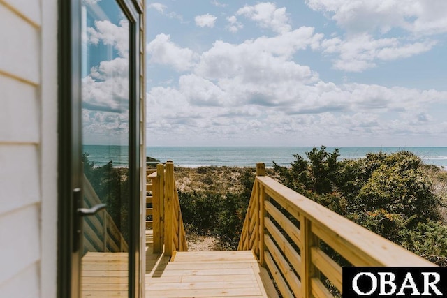 exterior space featuring a beach view
