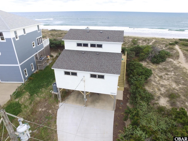 aerial view featuring a beach view and a water view