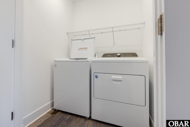 1206 Windance Ln Lot 103, Corolla, NC 27927 - laundry area with independent washer and dryer, dark wood-style flooring, and baseboards