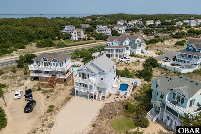 1206 Windance Ln Lot 103, Corolla, NC 27927 - aerial perspective of suburban area featuring a pool area