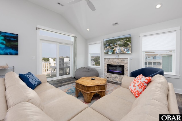 1206 Windance Ln Lot 103, Corolla, NC 27927 - living area with vaulted ceiling, recessed lighting, a ceiling fan, a fireplace, and wood finished floors
