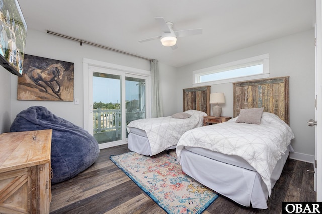 1206 Windance Ln Lot 103, Corolla, NC 27927 - bedroom featuring access to exterior, dark wood-type flooring, and a ceiling fan