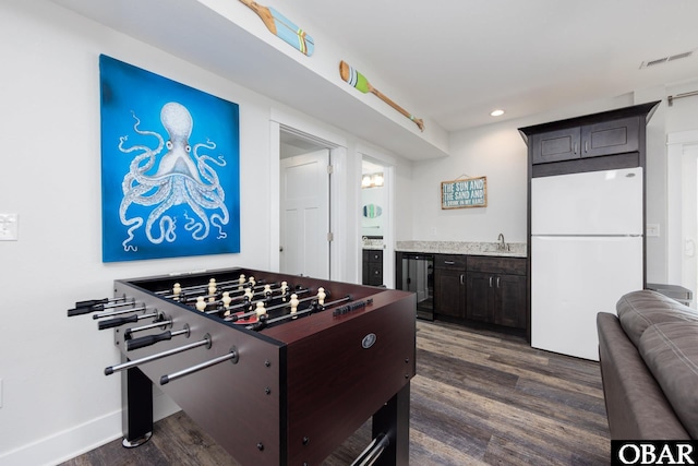1206 Windance Ln Lot 103, Corolla, NC 27927 - recreation room featuring wine cooler, dark wood-style flooring, wet bar, recessed lighting, and baseboards