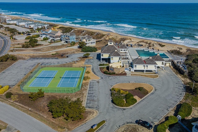 bird's eye view featuring a water view and a view of the beach