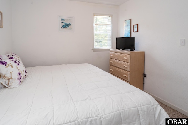 631 Skimmer Ct Lot 17, Corolla, NC 27927 - bedroom with carpet floors and baseboards