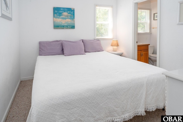 631 Skimmer Ct Lot 17, Corolla, NC 27927 - bedroom with carpet and connected bathroom
